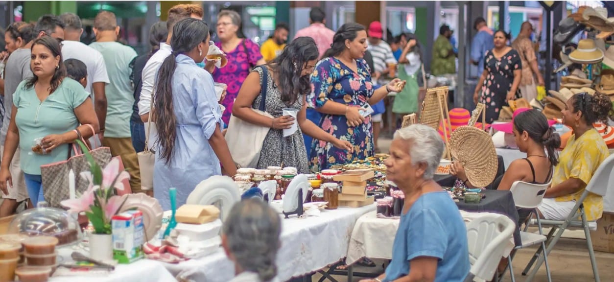A busy market in Fiji where people buy and sell their goods